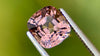 Exquisite 1.78-carat cushion-cut natural spinel in a rare pale brown hue, measuring 7x6.7x4.7mm. This unique gemstone is an exceptional choice for high-end bespoke jewellery, offering both rarity and understated elegance.