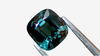 1.44ct Teal Green Natural Burmese Spinel, cushion-cut, eye-clean clarity gemstone. Vibrant sparkle and depth, perfect for bespoke fine jewellery designs.