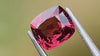 Pink brownish-red spinel gemstone, 1.53 carats, from Burma, cushion-cut and hand-cut, captured in natural daylight to showcase its rich colour and craftsmanship. Perfect for a custom jewellery centre stone or engagement ring.