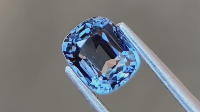 Mogok origin Greenish-blue natural spinel gemstone, 0.85 carat, captured in daylight to highlight its vibrant colour and unique appeal. Ideal for bespoke jewellery designs.