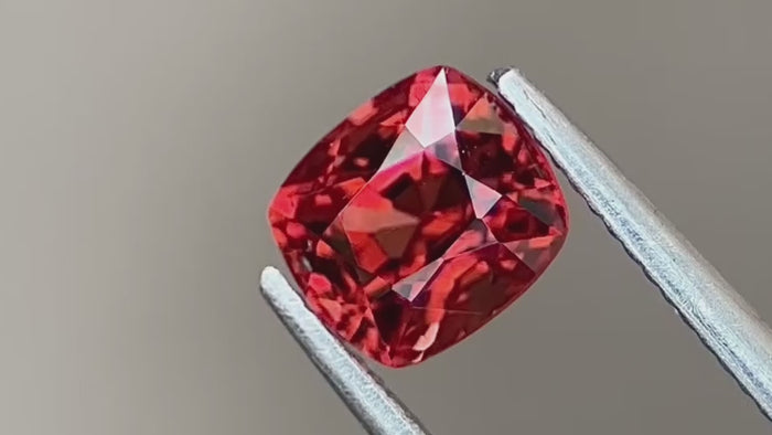 Red-orange spinel, showcasing its natural brilliance and vivid hue under various lighting conditions. Sourced directly from Myanmar, ensuring authenticity and ethical origins.