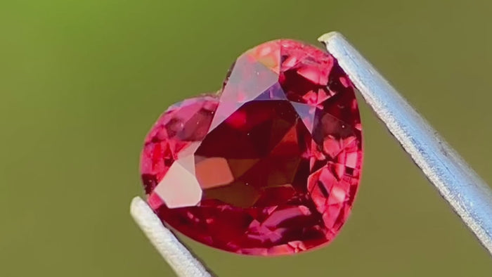 Unique 1.00ct heart-shaped pinkish-red Mogok origin Burmese spinel gemstone, perfect for luxury engagement rings.