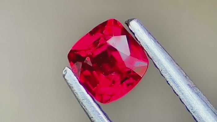 Vibrant neon red spinel gemstone, ethically sourced from Myanmar, perfect for custom jewellery designs.