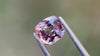 Cushion cut purplish-brown gemstone with rare colour. Ideal for distinctive jewellery designs.