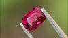 Radiant red cushion-cut Mogok spinel, showcasing rich hues and clarity, ideal for affordable and stylish gemstone jewellery.