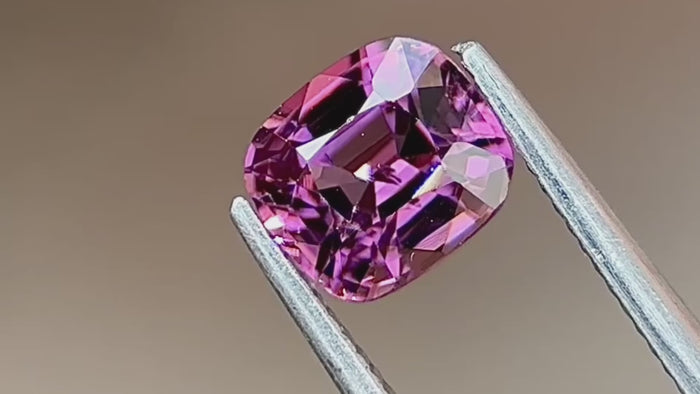 1 carat bright transparent purple spinel, showcasing its stunning brilliance and rich hue.